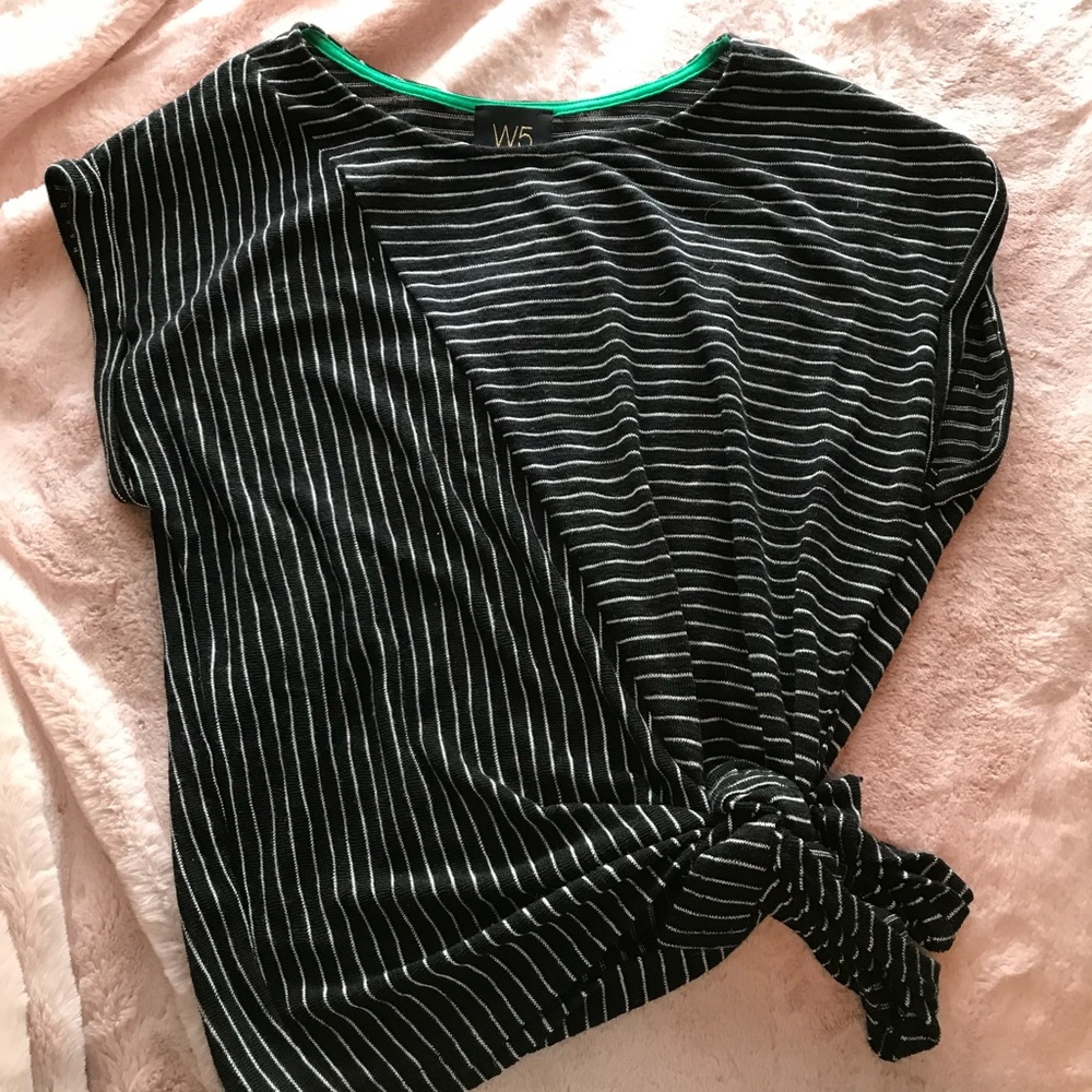 Black and white striped tie in front top.